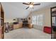 Bright bedroom featuring a built-in desk, workstation, and large window at 270 Kemp Rd, Mooresville, NC 28117