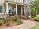 Charming front porch with stone accents, railings, and inviting entrance at 270 Kemp Rd, Mooresville, NC 28117