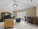 Spacious living room with vaulted ceiling, fan, and ample natural light at 270 Kemp Rd, Mooresville, NC 28117