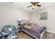 Cozy bedroom featuring wood-look flooring, ceiling fan, and ample sunlight at 2885 Wright Ave, Salisbury, NC 28147