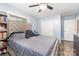 Bright bedroom featuring wood-look flooring, blue walls, and a large closet at 2885 Wright Ave, Salisbury, NC 28147