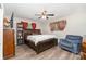 Spacious main bedroom with a ceiling fan, wood-look flooring, and large windows at 2885 Wright Ave, Salisbury, NC 28147