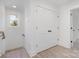 Hallway with closet and vinyl flooring at 318 Sixth St, Belmont, NC 28012