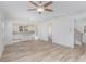 Open-concept living area with hardwood floors, with easy access to the kitchen and stairway at 318 Sixth St, Belmont, NC 28012