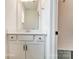 Bathroom with white cabinets, drawers, sink, modern mirror, and fixtures for a clean and functional space at 3229 Bozeman Ct # 13, Stanley, NC 28164
