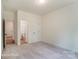 Neutral bedroom with ensuite bath and walk-in closet at 3229 Bozeman Ct # 13, Stanley, NC 28164