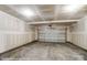 Spacious two-car garage, with a clean concrete floor and a white garage door that is ready for customization at 3229 Bozeman Ct # 13, Stanley, NC 28164