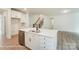 Modern kitchen with an island, stainless steel appliances and a view to the staircase and main living area at 3229 Bozeman Ct # 13, Stanley, NC 28164