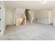 Open loft area with plush carpeting, stairs, and ample natural light, perfect for relaxation or recreation at 3229 Bozeman Ct # 13, Stanley, NC 28164