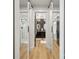 Modern bathroom featuring double mirrors, dark cabinetry, and a glass-enclosed shower at 324 Elm St, Belmont, NC 28012
