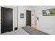 Bright bedroom with a sleek gray color palette, modern decor and stylish furnishings at 324 Elm St, Belmont, NC 28012