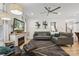 Cozy living room featuring a modern fireplace, neutral decor, and hardwood floors at 324 Elm St, Belmont, NC 28012