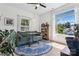 Cozy living room with a green sofa and lots of natural light at 324 Elm St, Belmont, NC 28012
