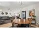 Open-concept living space features a kitchen, dining, and living room at 324 Elm St, Belmont, NC 28012