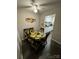 Charming dining room with a sunflower table set offering a bright, inviting space for meals at 415 Orchard Trace Ln # 1, Charlotte, NC 28213