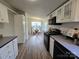 Bright kitchen with stainless steel appliances and breakfast area by a sunny window at 5010 Hemphill Rd, Gastonia, NC 28056