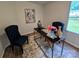 Inviting home office with modern desk, stylish seating, and bright natural light at 5010 Hemphill Rd, Gastonia, NC 28056