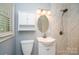 Modern bathroom featuring a pedestal sink, updated vanity, and a shower at 5100 Crestland Ave, Charlotte, NC 28269