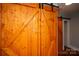 An interior angle shows wooden barn doors at 5100 Crestland Ave, Charlotte, NC 28269