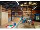 Garage interior featuring skate ramp and memorabilia; ideal for hobbyists or collectors at 5100 Crestland Ave, Charlotte, NC 28269