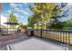 Spacious deck overlooking a serene lake view, featuring a grill and outdoor furniture at 532 Dalkeith Ave, Rock Hill, SC 29732