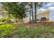 Backyard view showing well-maintained lawn with a deck perfect for outdoor activities and relaxation at 532 Dalkeith Ave, Rock Hill, SC 29732