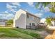 Backyard view showing a well-kept lawn with a wooden deck and outdoor seating area at 532 Dalkeith Ave, Rock Hill, SC 29732