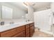 Bathroom with double sinks, vanity and a shower with curtain at 532 Dalkeith Ave, Rock Hill, SC 29732