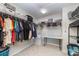 Walk-in closet with clothing on hangers and shelving at 532 Dalkeith Ave, Rock Hill, SC 29732