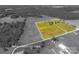 Aerial view with approximate lot lines highlighting property featuring a house with a pool and extensive green space at 5873 Alexis Ln, Vale, NC 28168