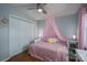 Charming bedroom with a canopy, hardwood floors and a large closet at 5873 Alexis Ln, Vale, NC 28168