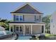 Charming two-story house featuring a welcoming front porch and a well-maintained exterior at 668 Smith St, Kannapolis, NC 28083