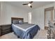 Comfortable bedroom with wood ceiling fan, soft carpeting and a serene atmosphere at 7049 Irongate Dr, Indian Land, SC 29707