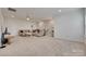 Spacious living room with plush seating, ceiling fan, and a light-filled atmosphere at 7049 Irongate Dr, Indian Land, SC 29707
