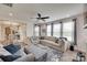 The open living room is well lit and spacious with comfortable furniture at 7049 Irongate Dr, Indian Land, SC 29707