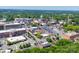 A panoramic aerial shot displaying an attractive cityscape featuring modern architecture and urban infrastructure at 83 Woodsdale Se Pl, Concord, NC 28025