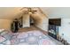 Comfortable bedroom with sloped ceilings, providing a cozy and inviting space at 8520 Wright Rd, Kannapolis, NC 28081