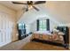 Cozy bedroom featuring a unique ceiling, window view, and comfortable furnishings at 8520 Wright Rd, Kannapolis, NC 28081