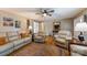 Cozy living room with a decorative rug, fan, and an inviting sitting arrangement at 8520 Wright Rd, Kannapolis, NC 28081