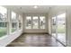 Bright sunroom with large windows and sliding glass door, offering natural light at 8619 Frank Grier Rd # 3, Charlotte, NC 28215