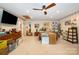 Cozy bedroom featuring a ceiling fan, warm carpet and lots of storage at 907 Sikes Mill Rd, Monroe, NC 28110