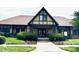 Charming clubhouse with manicured landscaping, creating an inviting community gathering spot at 10008 King George Ln, Waxhaw, NC 28173
