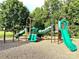 A fun playground area offers slides and climbing structures for to be active and enjoy outdoor play at 10008 King George Ln, Waxhaw, NC 28173