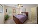 Cozy bedroom with natural light, a comfortable bed, and a relaxing atmosphere at 10434 Blackstock Rd, Huntersville, NC 28078