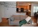 Comfortable living room showing decorative plants and a view into the kitchen at 10434 Blackstock Rd, Huntersville, NC 28078