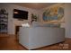 Comfortable living room featuring a fireplace and beautiful hardwood floors at 10434 Blackstock Rd, Huntersville, NC 28078