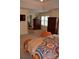 Comfortable main bedroom showcases shuttered windows and classic wooden furniture at 10434 Blackstock Rd, Huntersville, NC 28078