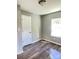 Inviting room featuring vinyl floors, a bright window, and neutral paint, creating a blank canvas at 1052 S Grove Street Ext, Lincolnton, NC 28092