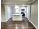 Open concept with a bright kitchen and island that includes stainless steel appliances at 1052 S Grove Street Ext, Lincolnton, NC 28092