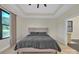 Primary bedroom with modern black window and a king size bed at 1141 Harper Lee Dr, Newton, NC 28658
